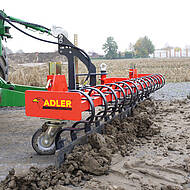 Kommunale Stra&szlig;enreinigung: Kratzvorrichtung gegen hartn&auml;ckigen Dreck