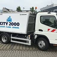 FAUN mit Kehrmaschine und Entsorgungsfahrzeug auf der DEMOPARK 2017